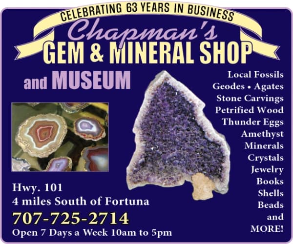 Chapman’s Gem & Mineral Shop and Museum sign with “CELEBRATING 63 YEARS IN BUSINESS,” address 707-725-2714 and hours.