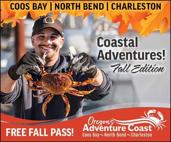 Smiling man holding a live crab; text: “COOS BAY | NORTH BEND | CHARLESTON,” “Coastal Adventures! Fall Edition,” “FREE FALL PASS!”